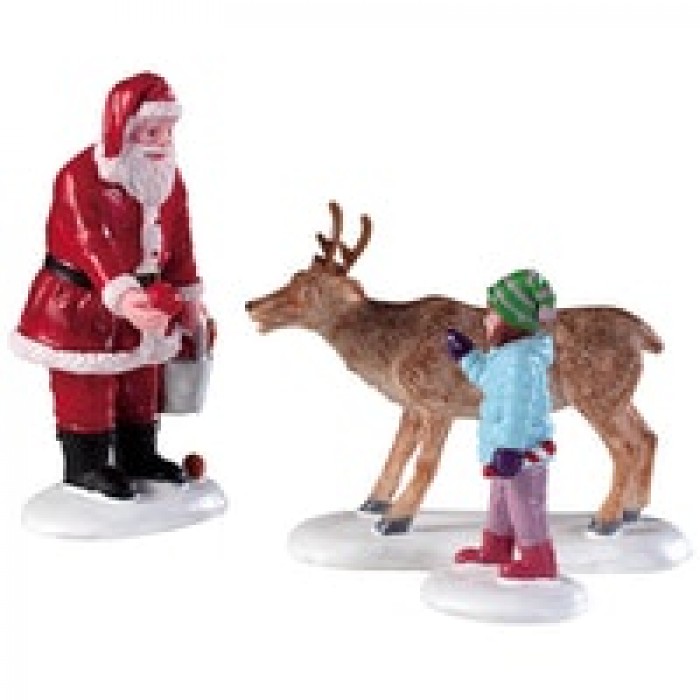 Figurines Père Noël qui donne à manger aux rennes # 92752